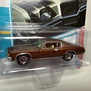 The Johnny Lightning 1971 Pontiac Grand Prix Bronze Gold 1:64 Diecast